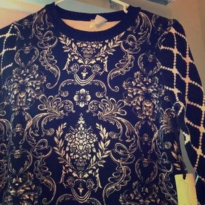 Black and white print sweater new with tags.